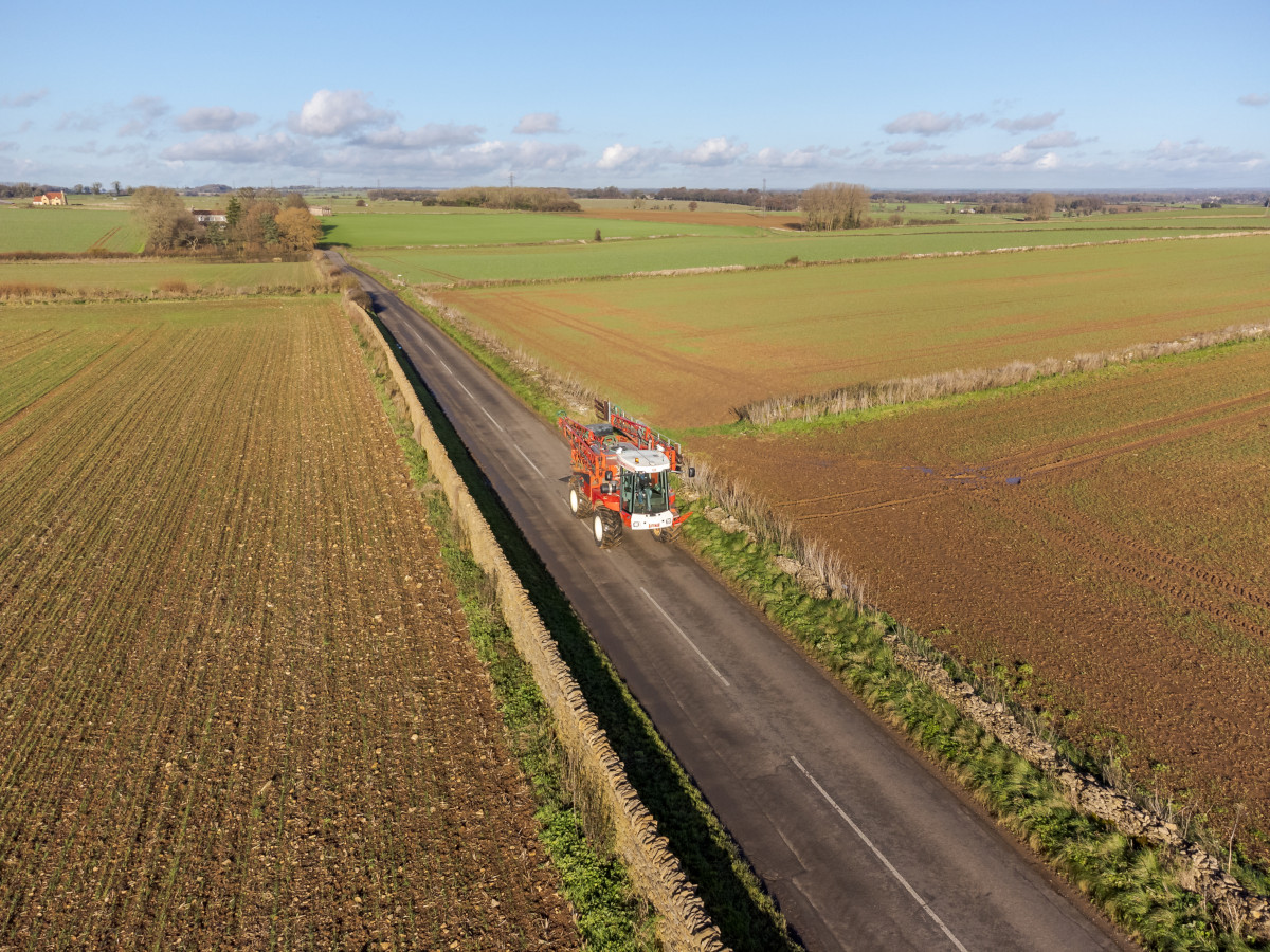 aerial-shot-of-iains-bateman-sprayer aerial shot of Iain Robertson in his RB35 crop sprayer